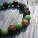 Natural Gemstone Stretchy Fall Tone Bracelet Green and Red Rare Gemstone beads. Red, Green, Blue