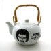 Lionel Richie Teapot Hello Is It Tea With rattan handle