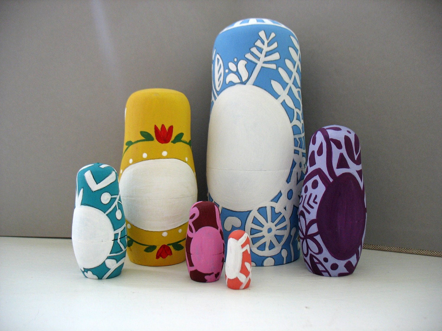 handmade wood folk art nesting dolls....  Custom MESSAGE.. paper cut portrait series.