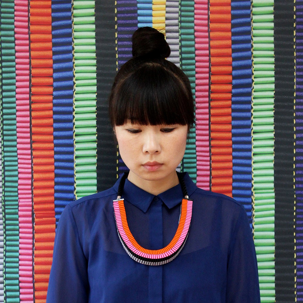 The Mini Clemence woven necklace in pink and orange