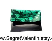 Leather and textured satin fold over clutch