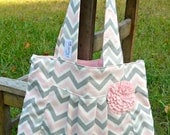 The LuLu, gray, pink and white chevron diaper bag with light pink lining and rosette