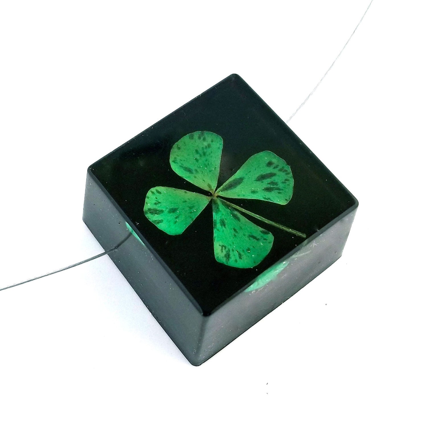 Four Leaf Clover set into Black Resin Cube. Black Botanical Resin Necklace. Real Flower Shamrock.