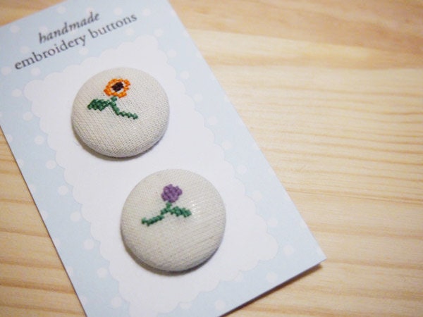 Floral embroidery fabric covered button pair