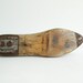 One industrial rustic wood shoe form