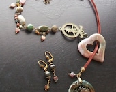 India Agate Gemstone Heart and Dragon Focal Asymmetrical Necklace Set-The Happy Dragon-Mauve, Green, Burgundy with Brass on Brown Velvet