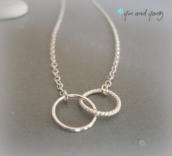 yin and yang - sterling silver circles - one twisty and one smooth - charming simplicity