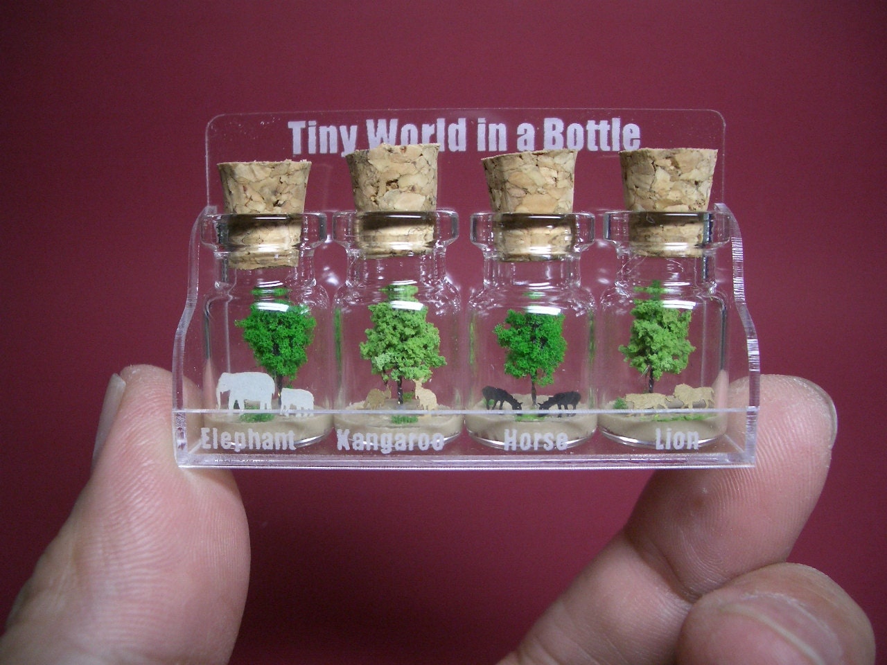 4 animal in 4 tiny bottles in a small cute case