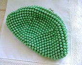 wonderful vintage 1950s pearlized green beaded change purse Made in Japan