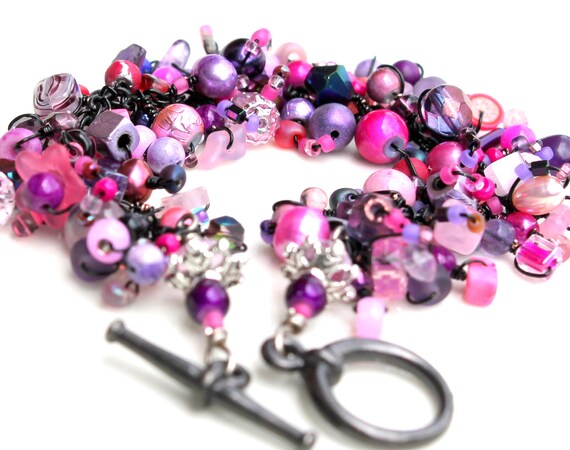 goth girl bracelet. pink and purple beaded jewelry.black wire wraps