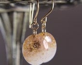 white earrings with gold glitter and gold leaf on gold earwires - resin drop earrings