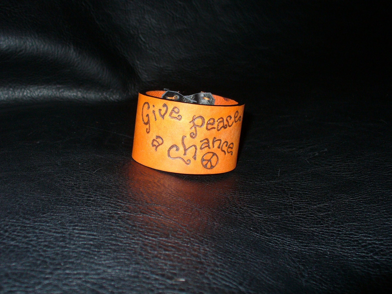 Handmade beige leather cuff. John Lennon. Give Peace a chance. Unisex.