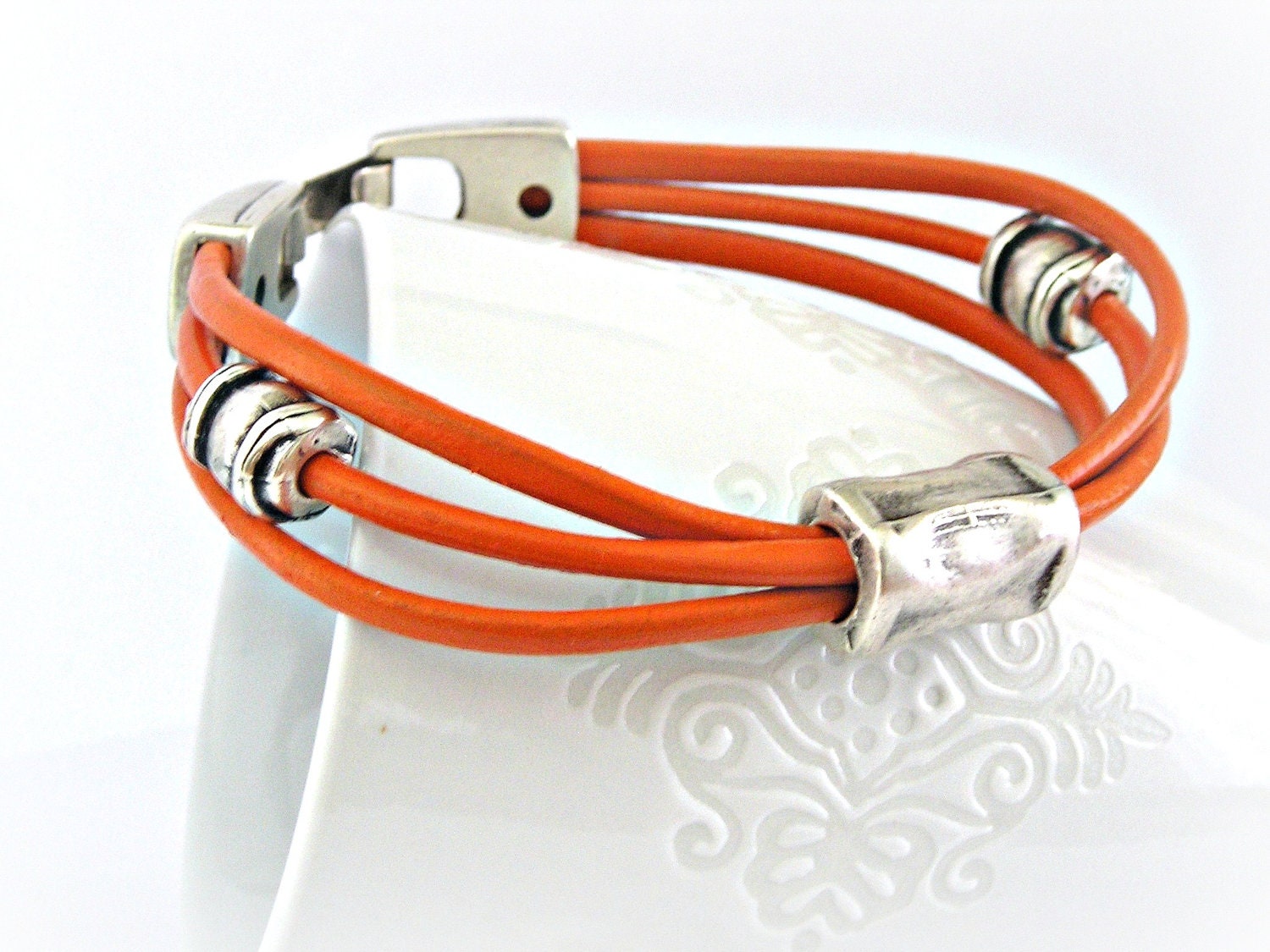 Orange triple leather zamak bracelet