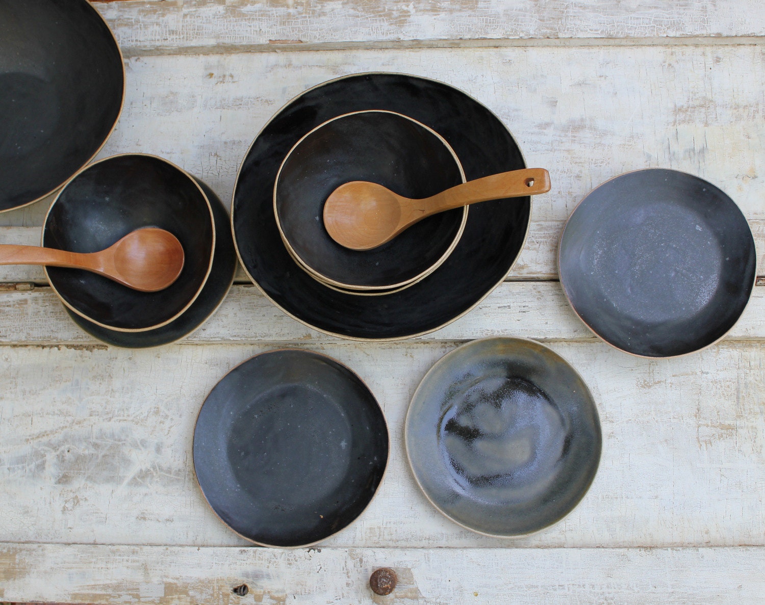 lovely black bowls with plates for soup or salad or cereal...