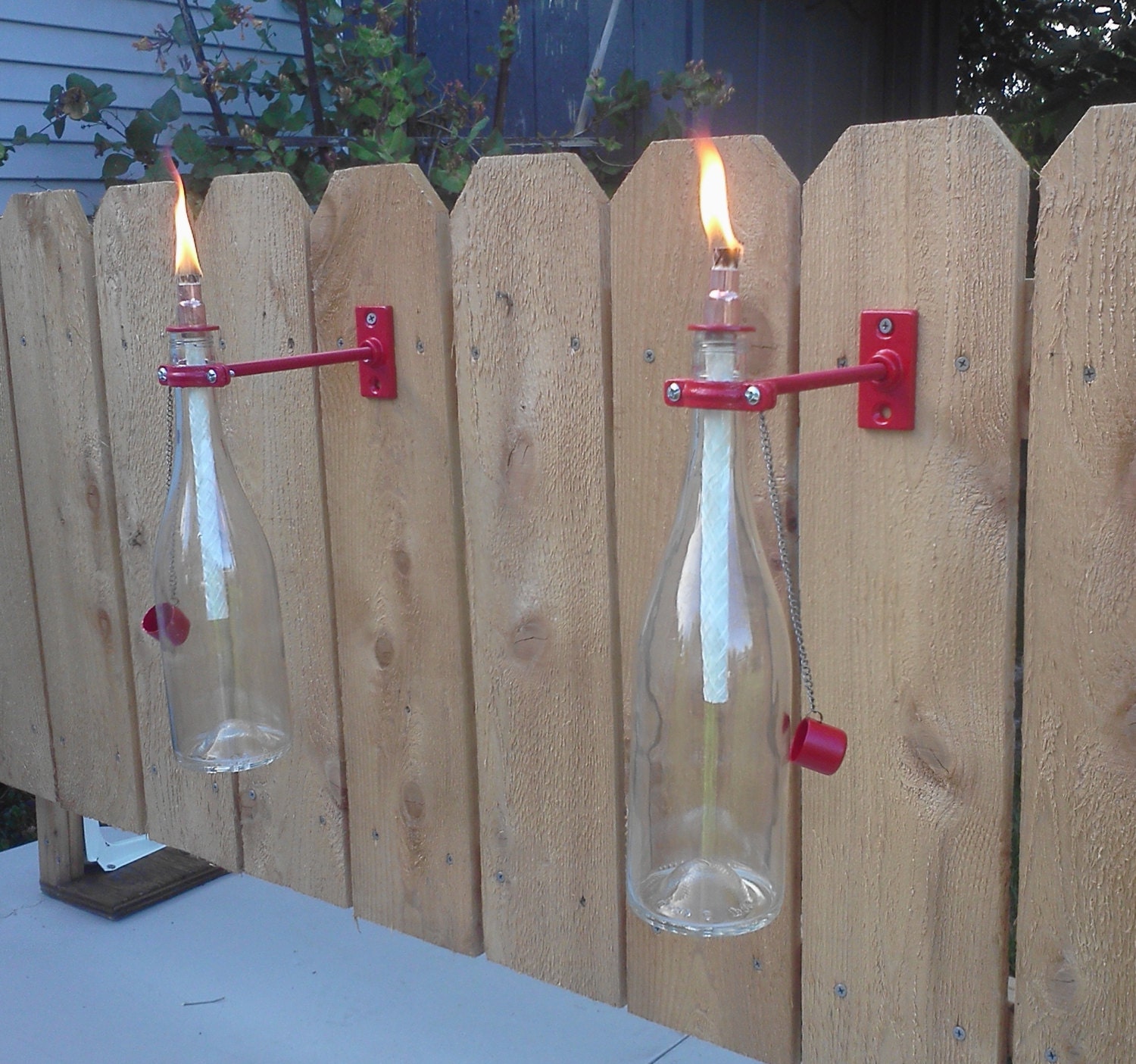 recycled wine bottle tiki torches ---- hardware in red with clear bottles (set of two )
