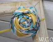 the ANYA Mustard, Teal and Grey Rosette Headband with Felt Leaves
