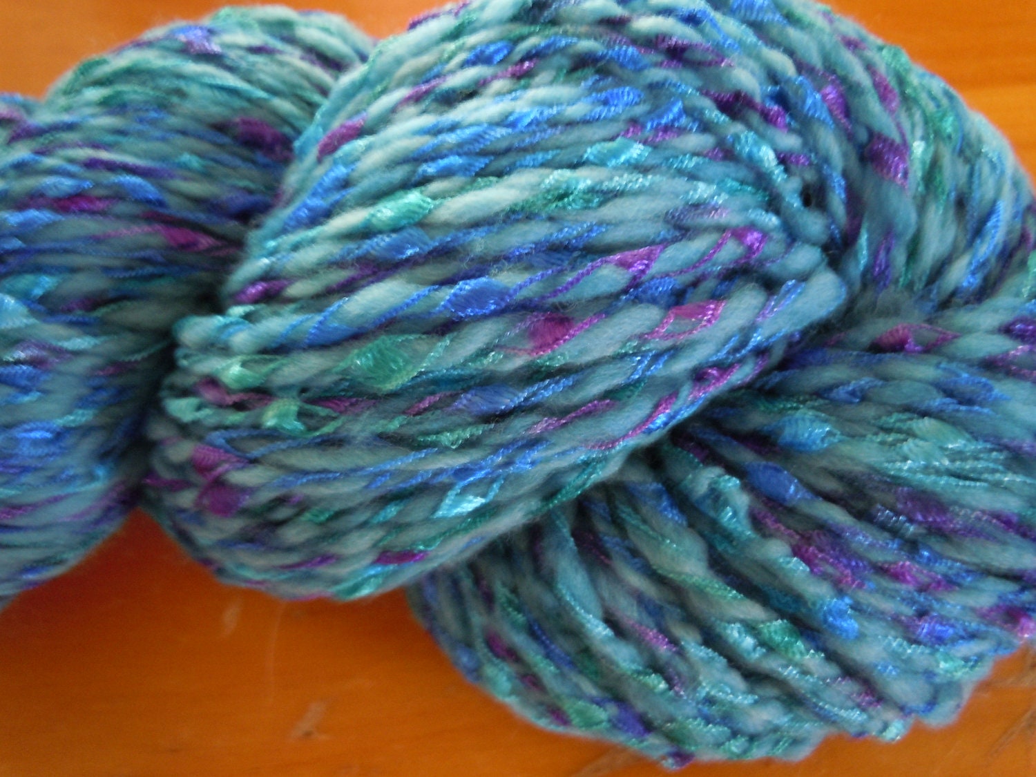Carnival, Handspun BFL Roving, plied with Dazzle