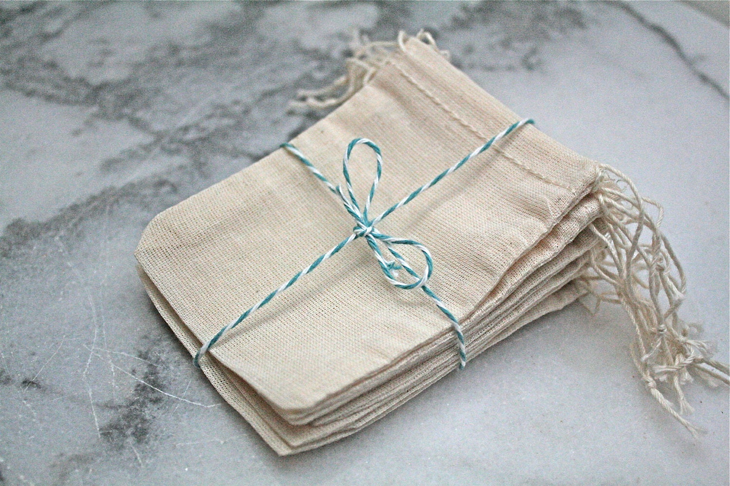Muslin favor bags, 2.5 x 4. Set of 25.  Unprinted natural cotton double drawstring bags.  Party favor or gift bags.