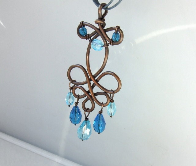 Turquoise blue necklace copper antiqued hungarian folk art motif wire wrapped pendant