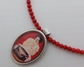 Vintage typewriter AD collection - the coral bamboo necklace with the vintage red Olivetti advertisement