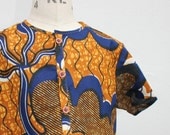 African 100% cotton Print boys grandad shirt in a brown and blue abstract pattern