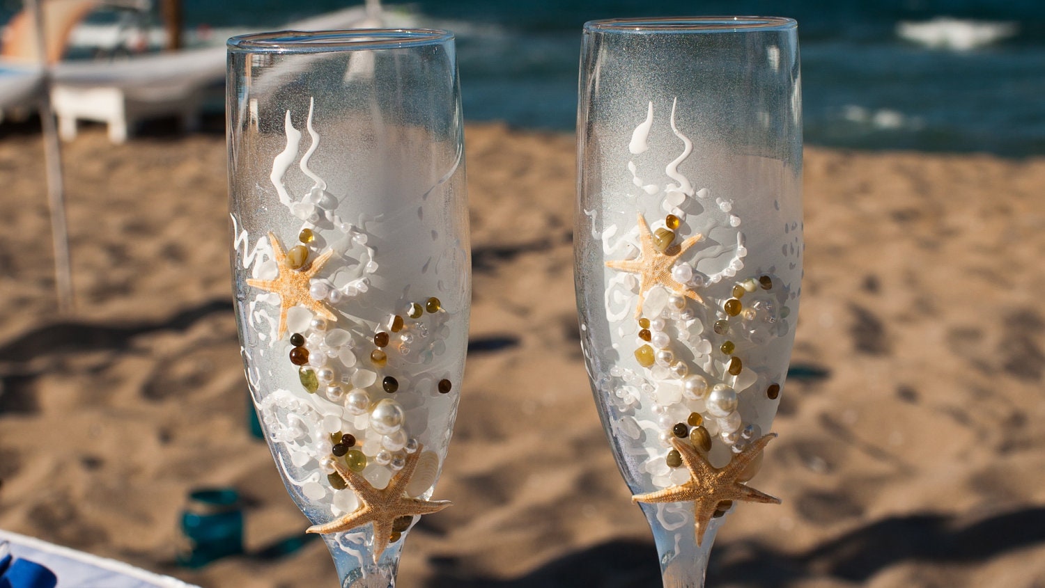Starfish wedding champagne glasses, decorated with real starfish, sea shells, sea glass and pearls