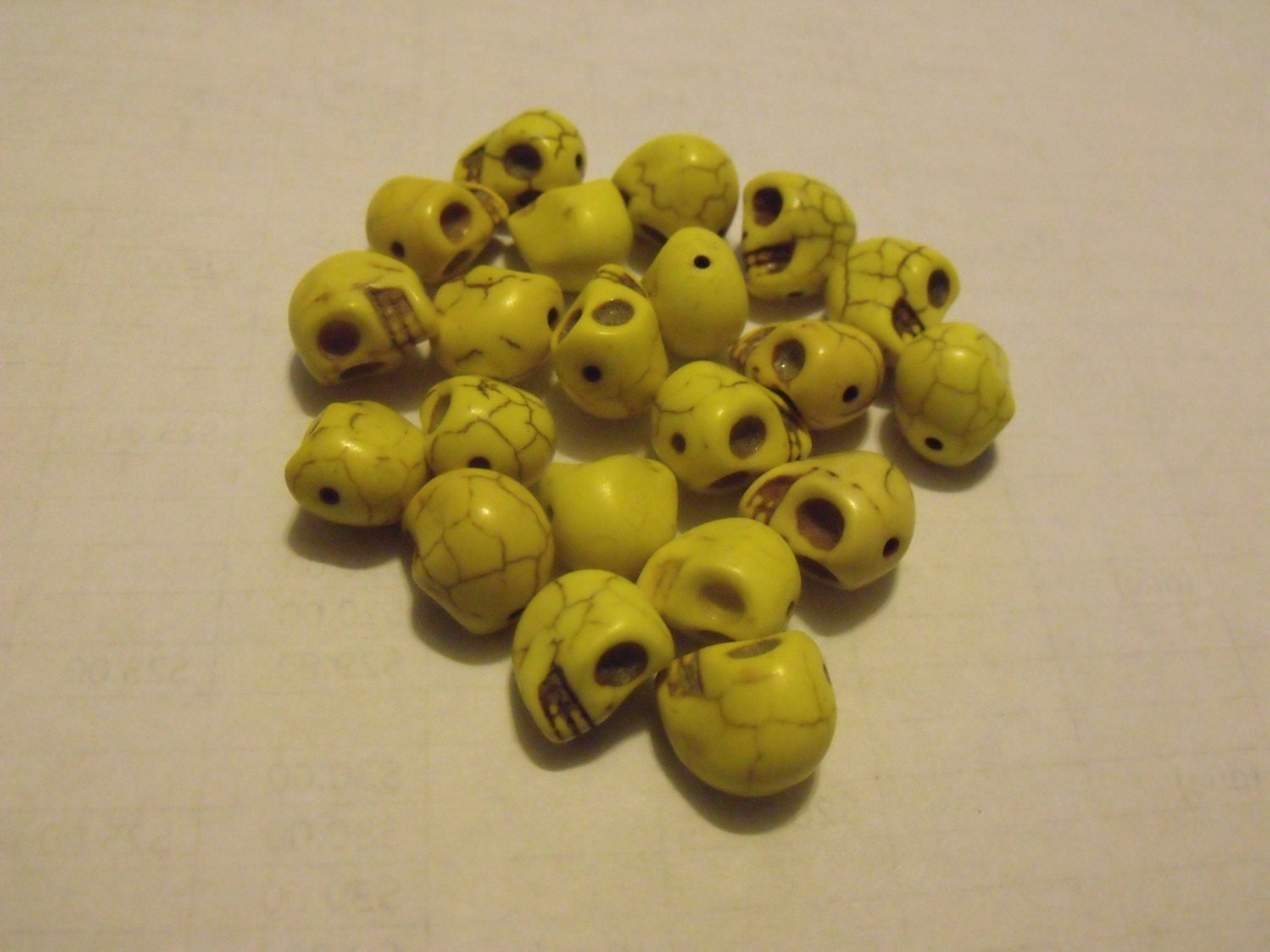 Destash of yellow howlite skull beads