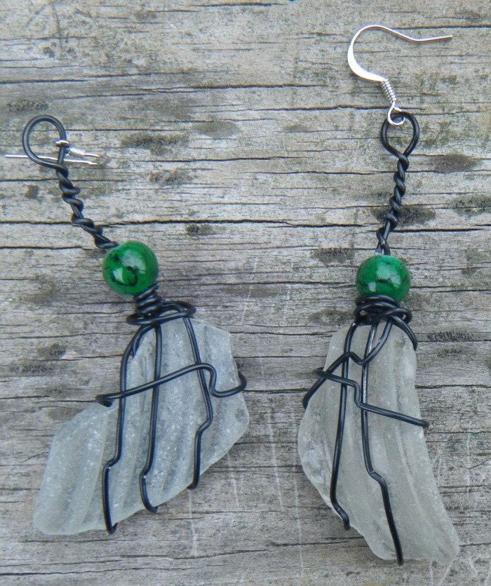 Beach Jewels. Wire Wrapped Sea Glass Earrings. Sea Glass Bottle Top Earrings wrapped in black with green beads. . ON SALE WAS 12.00