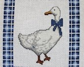 Completed cross stitched country goose with plaid