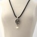 TINY FLOWER NECKLACE by Cheydrea