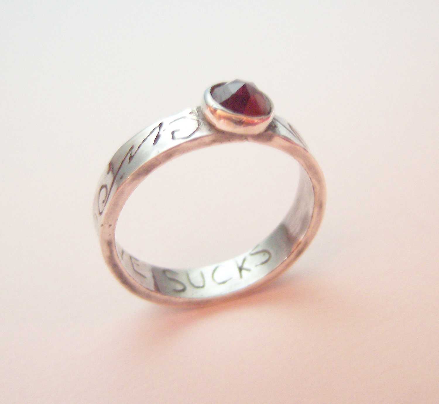 Vampire Diaries inspired etched silver and garnet ring with LOVE SUCKS inscription
