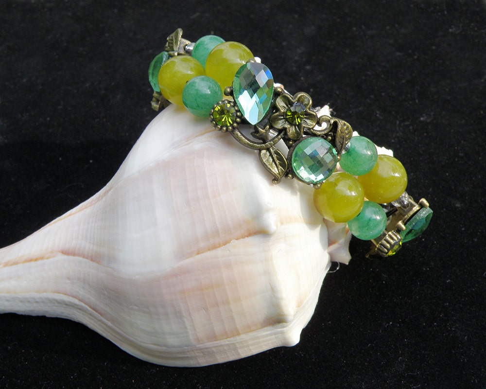 Green and Yellow Beaded Stretch Bracelet with Decorative Metal Sliders