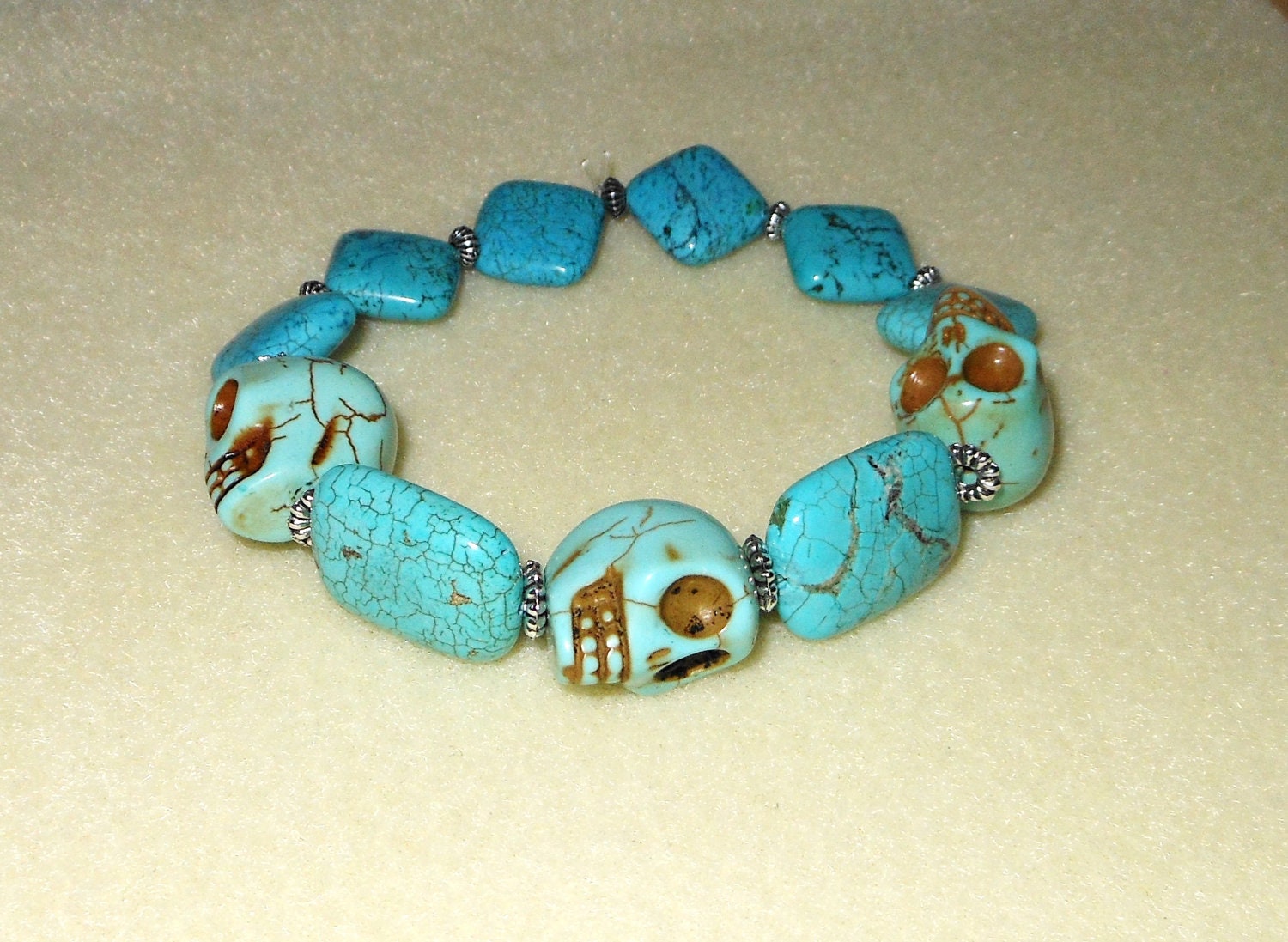 Genuine turquoise and howlite skull bead bracelet/stretch