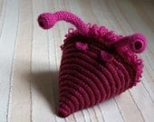 An exotic sea snail toy