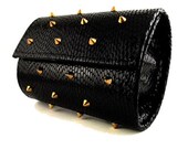 d.bgs spike studded clutch (black w. gold spikes)