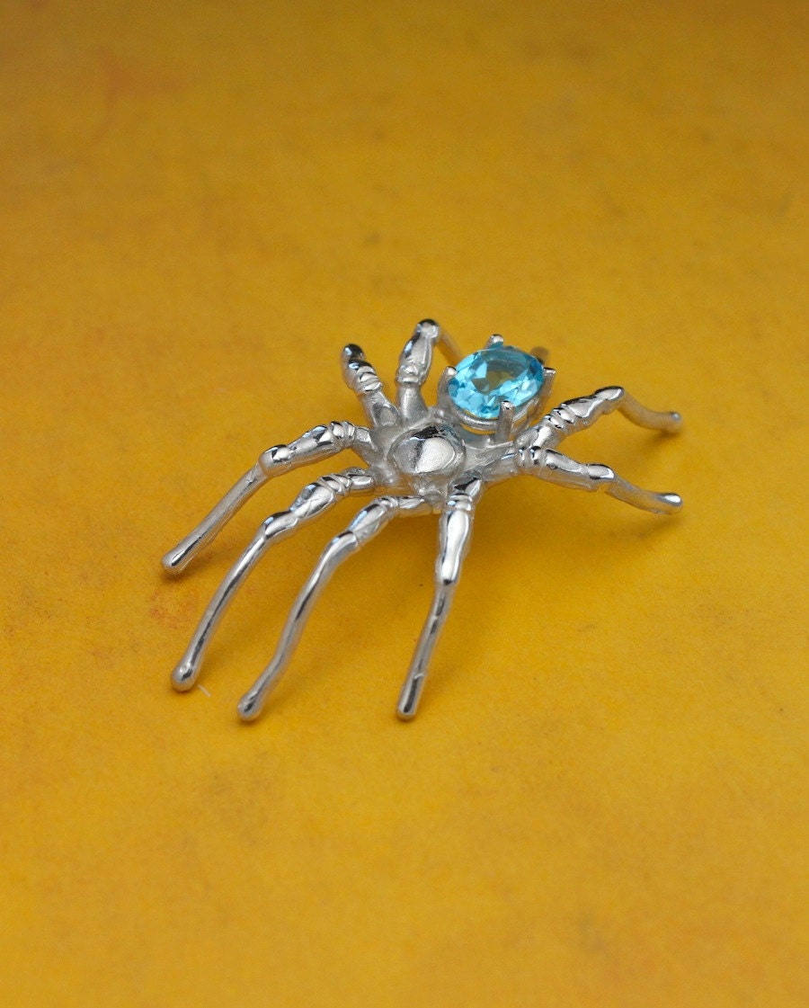 Blue Topaz Beauty, a spider inspired pendant.