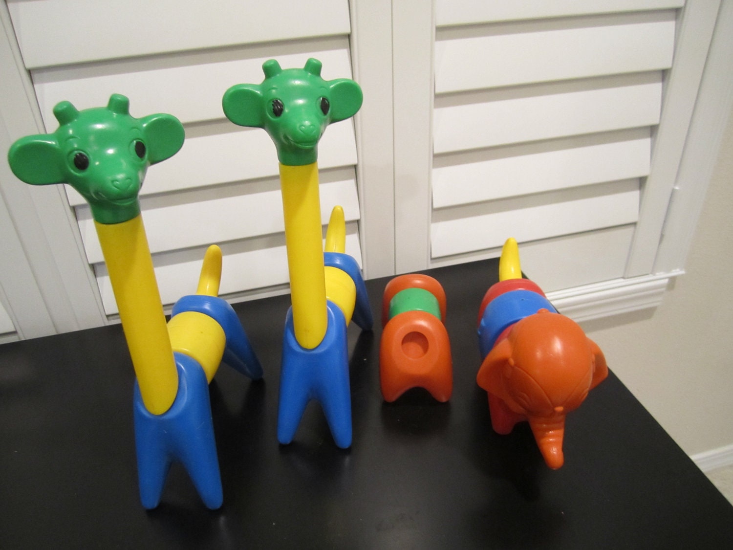 Vintage Tupperware Elephant Giraffes and extra pieces Toy puzzle animals