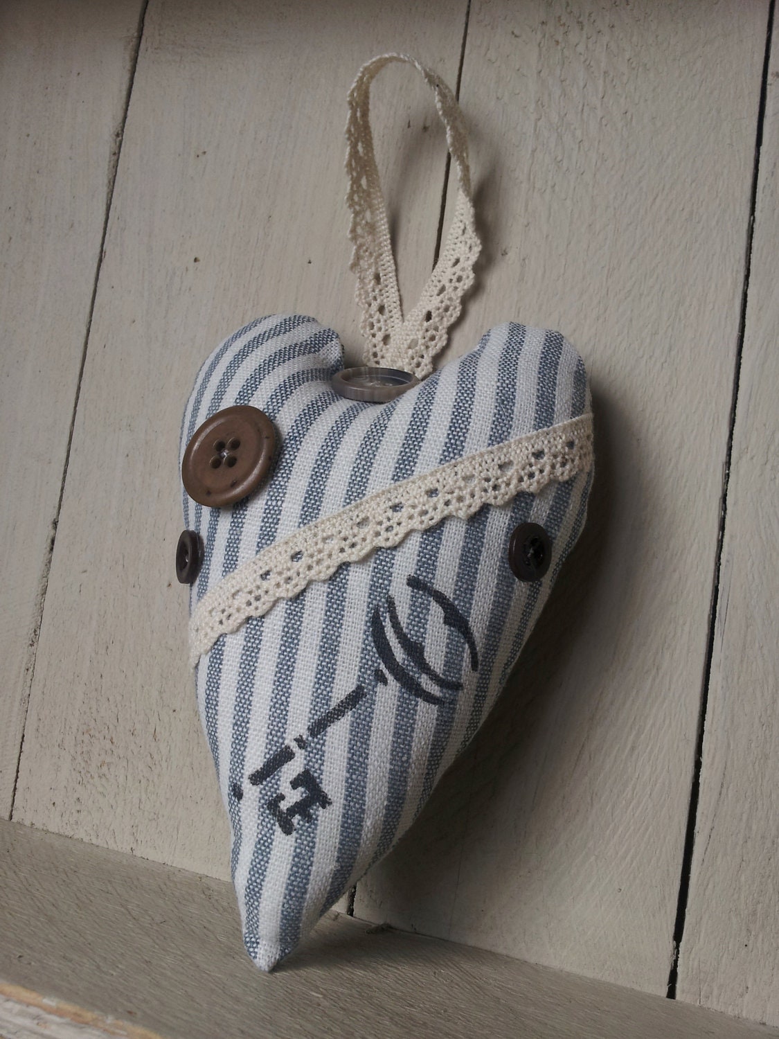 Rustic French ticking heart with key. 'Key to my heart'