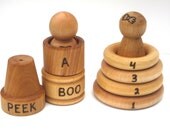 Little People Stacking set.   Can be personalized with baby's initial.