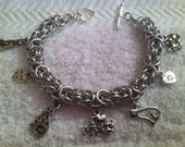 Chain maille bracelet with cat charms
