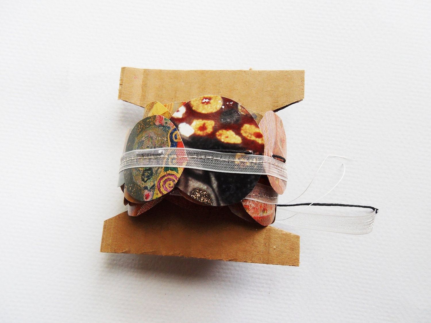 Paper Garland- sewn ribbon from recycled calendar art of Gustav Klimt. Gold accents fro Christmas, fall, thanksgiving