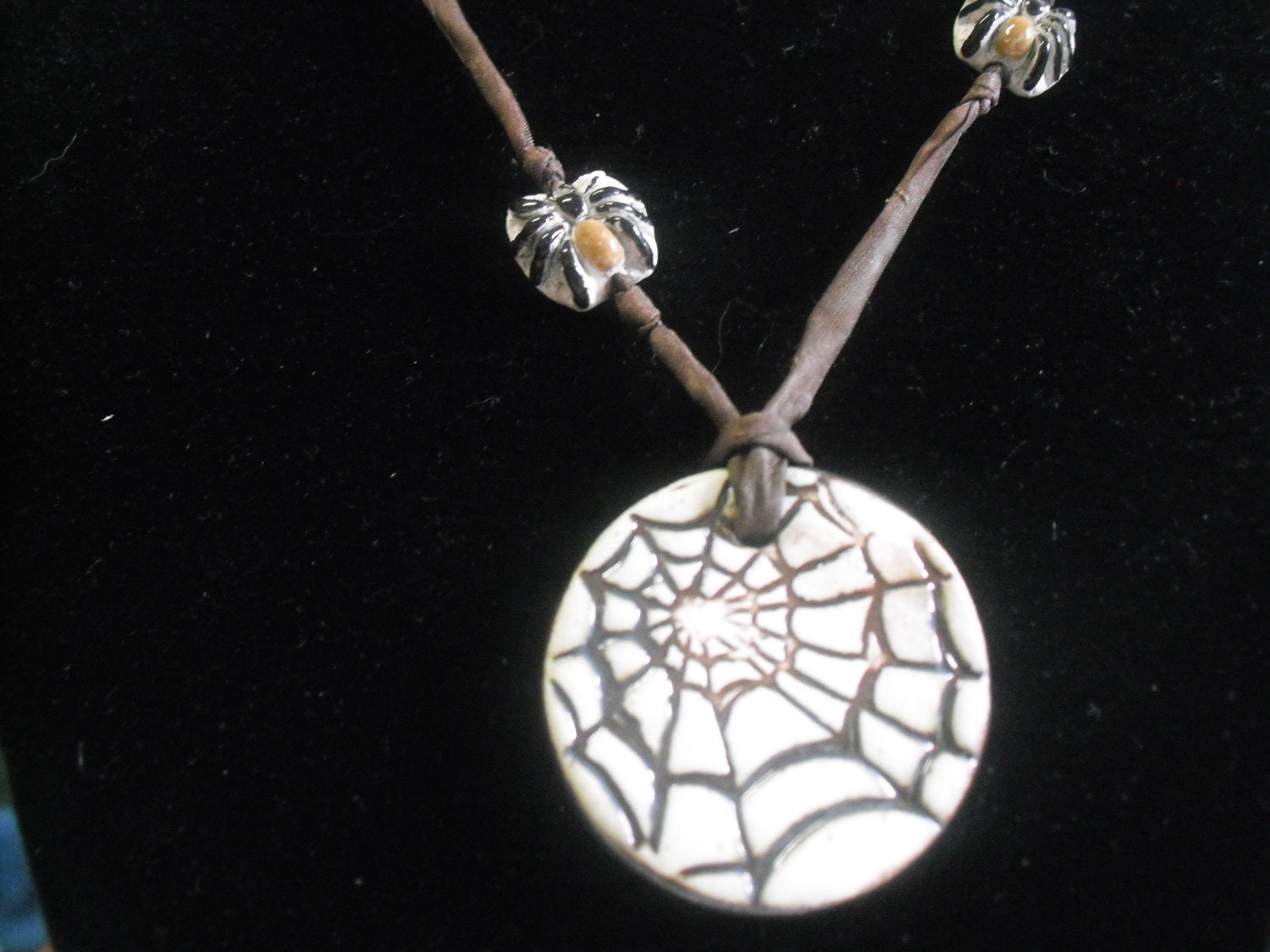 Ceramic spider web pendant hand beaded necklace