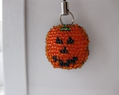 Spooky beaded pumpkin mobile phone charm