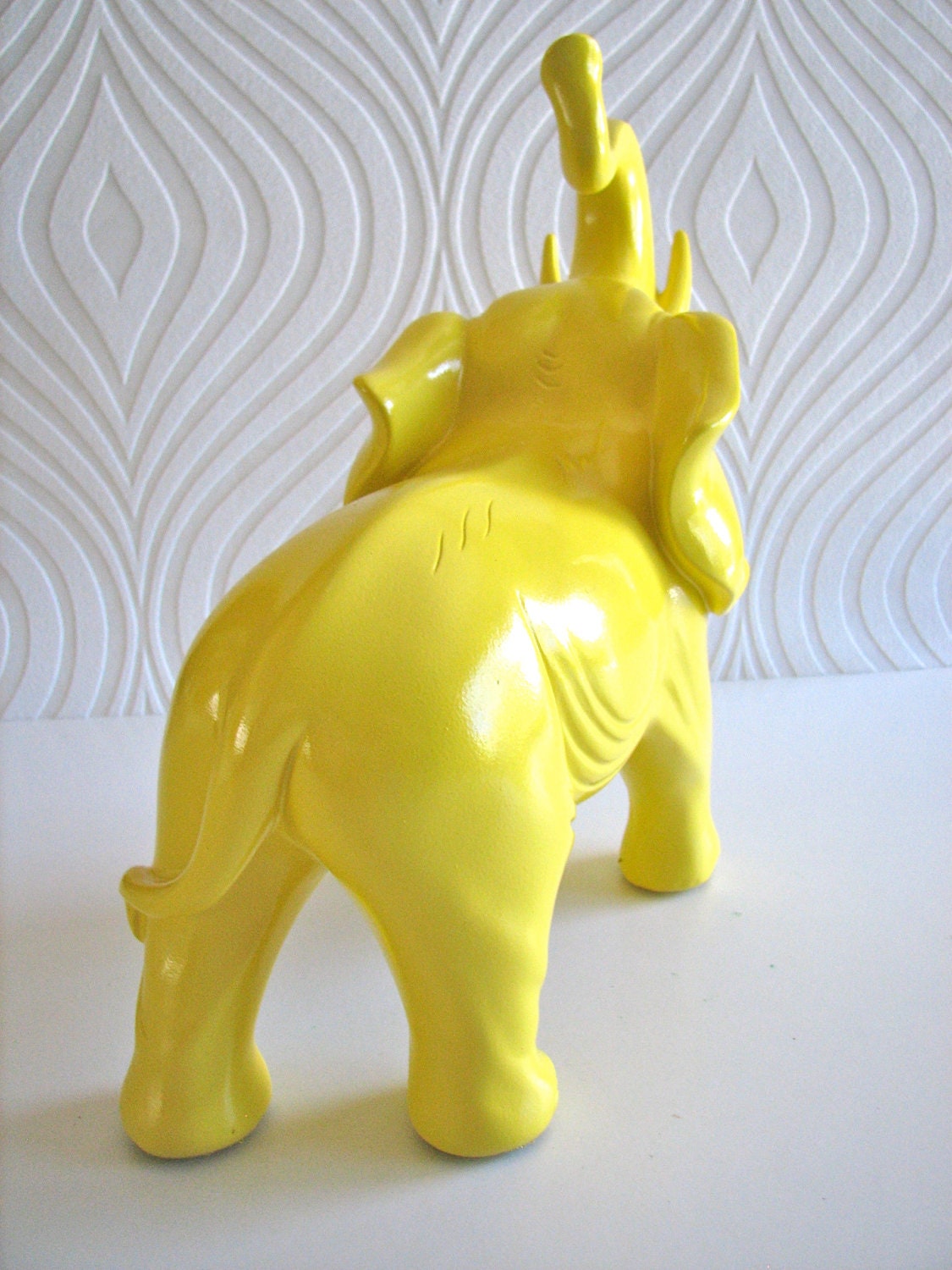 Ollie the fun glossy yellow elephant
