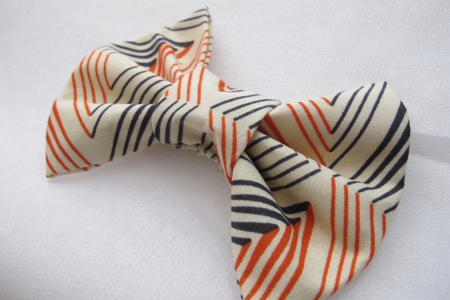 Bow tie button cover