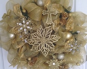 Golden Gorgeous Elegant Holiday Wreath adorned with Golden Trinkets, ornaments & embellished gold ribbon.