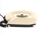 Vintage cream rotary telephone