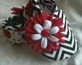 Zig Zag Ladybug Booties. Available in sizes 0-18 mo.