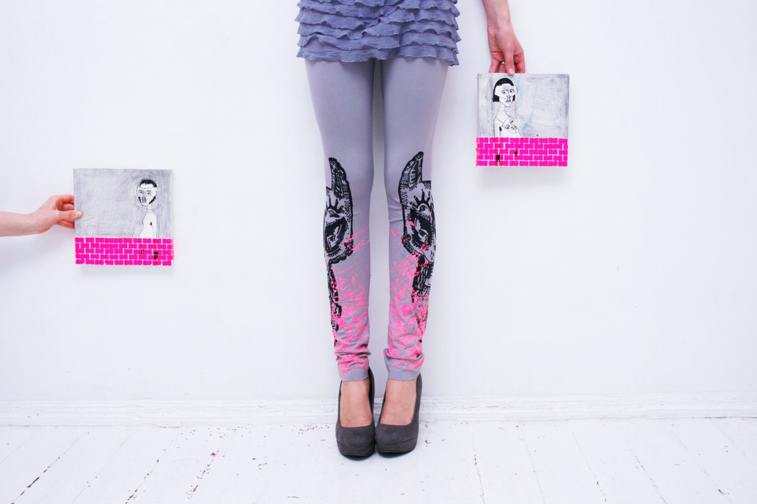 Soft gray leggings with black tribal animal printa and pink color splashes