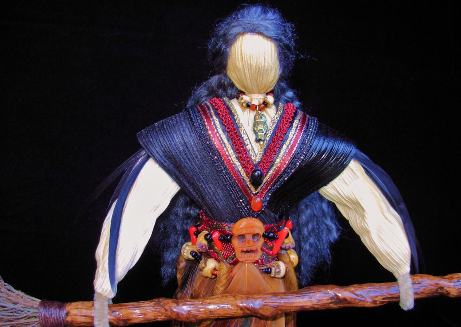 Red and Black  Feather-broom Crone